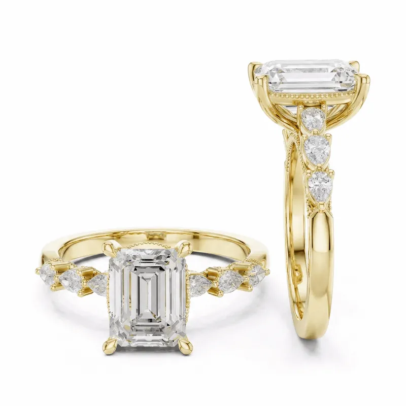 Emerald Cut Diamond Accent Pear Side Stone Shank in Yellow Gold
