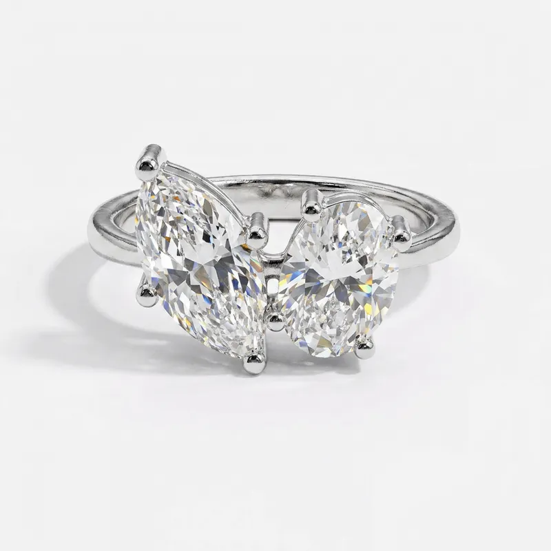 Oval Diamond Three-Stone with Pear Side Diamonds in White Gold