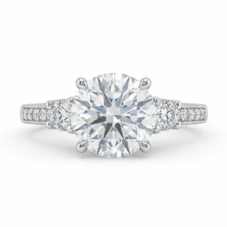 Round Brilliant Three-Stone with Milgrain Pavé Shank in White Gold