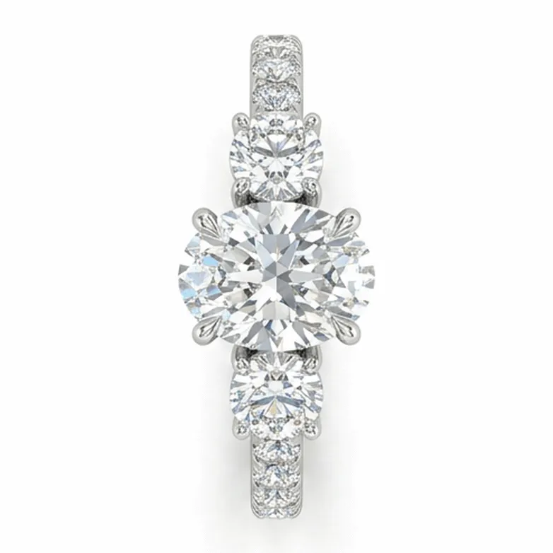 Round Brilliant Three-Stone with Round Sides and Pavé Shank in White Gold